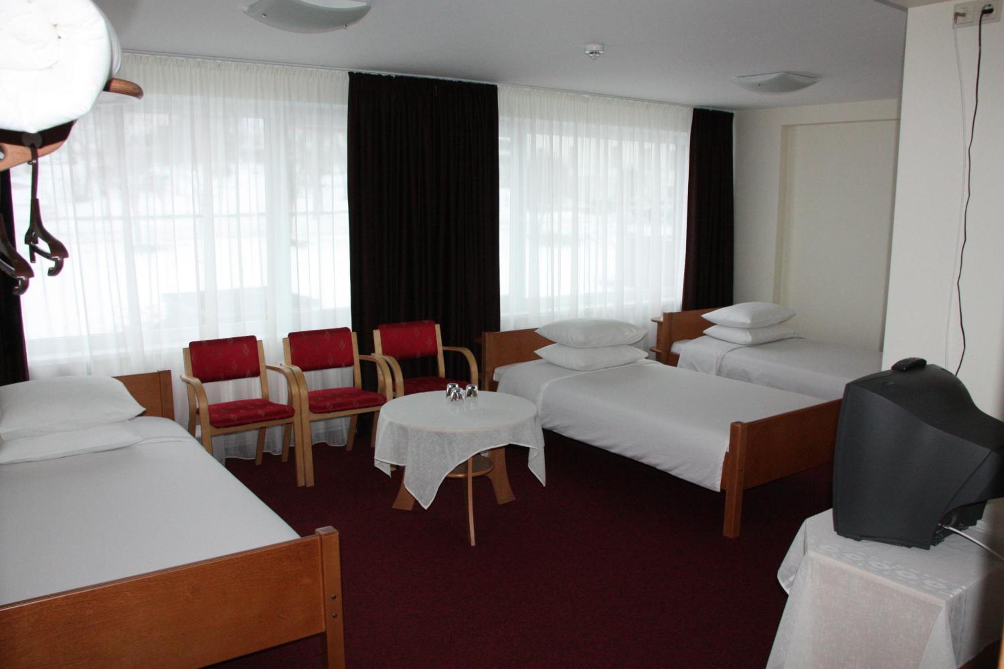 Hotel Madona Habitación foto