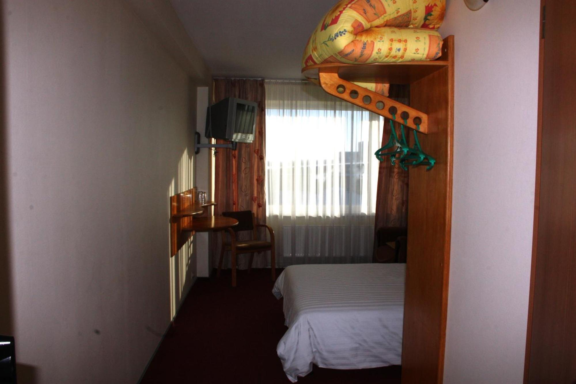 Hotel Madona Habitación foto