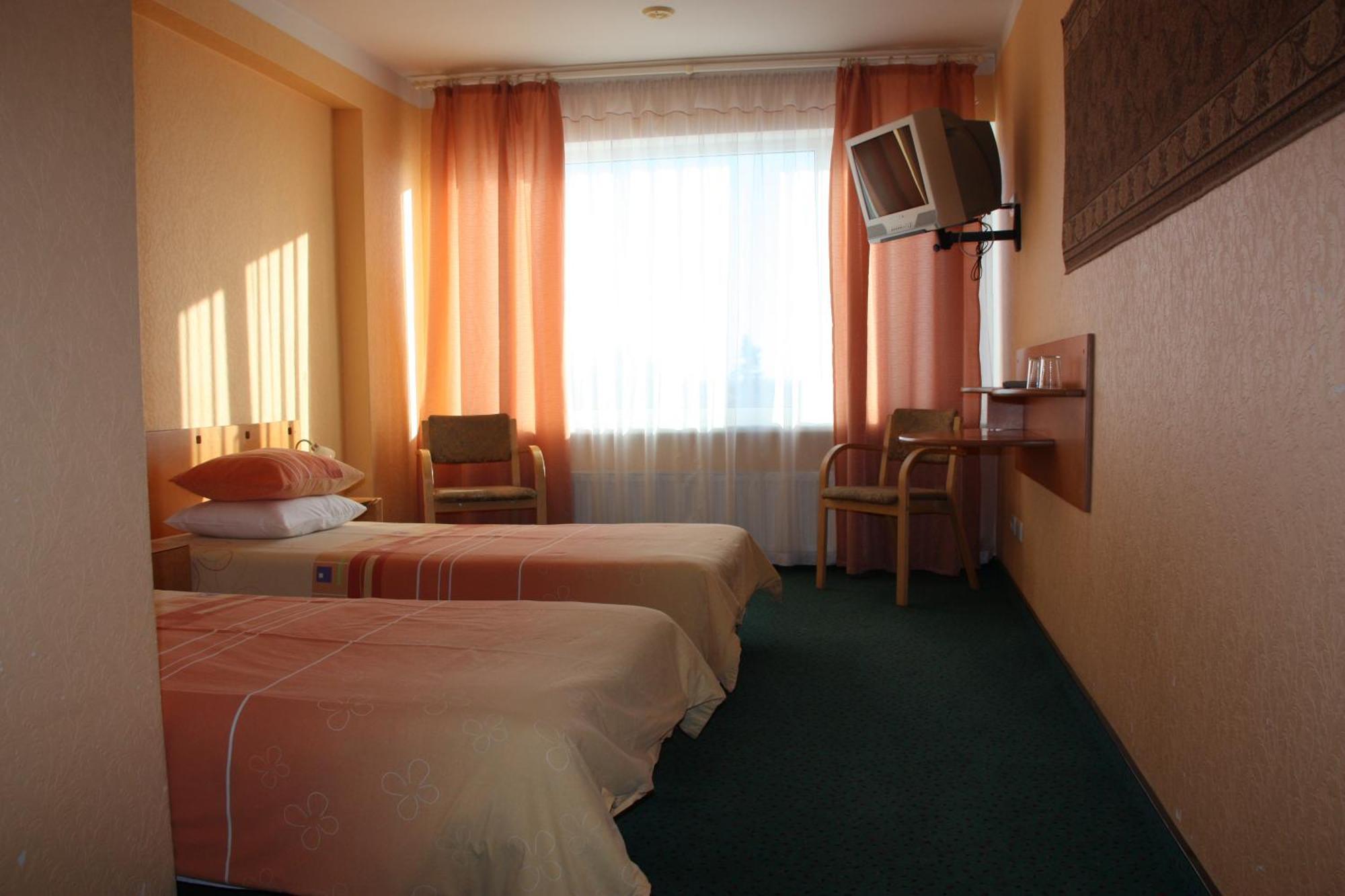 Hotel Madona Habitación foto